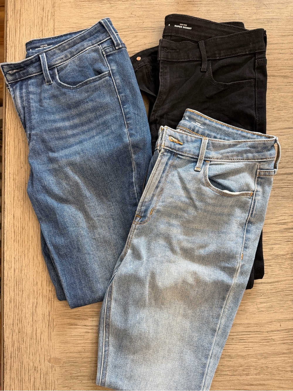 3 Pair Bundle: Old Navy Women’s Skinny Jeans in Light Blue, Medium Blue & Black